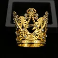 Detailed close-up of a gold hollow crown with sparkling rhinestones on black velvet - Gold Style (HG-024)