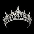 Macro detail of gothic silver crown featuring rhinestone-encrusted skulls and metal band - Silver