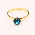 Anello regolabile placcato oro con zircone blu incastonato in una classica montatura a quattro griffe - Anello da Donna Zirconia Blu / Oro