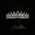 Elegant silver alloy bridal tiara crown featuring white rhinestones on a black stand - Silver (HG-155)
