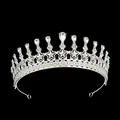 Elegant silver alloy bridal crown with sparkling rhinestones and crystal star patterns - Silver + White Zirconia