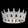 Close-up of silver crown with teardrop crystals and heart-shaped hollow metalwork - Silver & White