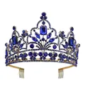 Close-up of gold bridal crown with deep blue rhinestones and side metal hair combs - Gold/Royal Blue