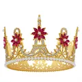 Close-up of golden bridal crown featuring Eiffel Tower motifs, pink crystals and pearls - Gold & Rose Red