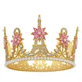 Detail of golden bridal tiara with Eiffel Tower motif, pink gems and white pearls - Gold + Pink