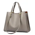 Sac fourre-tout gris en cuir grainé avec doubles poignées et détails métalliques dorés - Gris