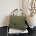 Olive green lychee texture leather tote bag with gold metal lock and shoulder strap - Green