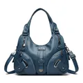 Navy blue faux leather hobo handbag with pebble texture and adjustable shoulder strap - Blue