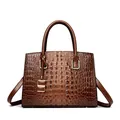 Brown crocodile embossed tote bag with gold hardware and top handle for women - Yellow