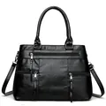Black pebbled faux leather tote bag with three functional front zipper pockets and top handles - Black