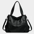 Schwarze Tote Bag aus Litschi-Leder mit silbernen Beschlägen und Schultergurt - Schwarz
