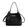 Minimalist black bucket bag with textured leather, top handle, and silver rotating lock - Black Without Charm