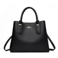 Classic black leather handbag for women featuring gold logo and double top handles - Black