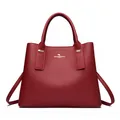 Elegant dark red satchel bag with litchi texture leather and golden hardware - Red