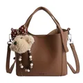 Brown faux leather bucket bag with litchi texture and cute teddy bear charm accessory - With Bear Charm / Brown
