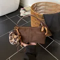 Vintage brown suede pillow bag with large gold ring and leopard faux-fur pompom charm - Suede Coffee With Pendant