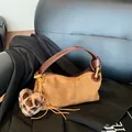 Vintage brown suede pillow bag with leather handle and leopard print heart charm - Suede Brown With Pendant