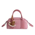 Pink Boston handbag with delicate leather texture and designer rocking horse charm - Pink