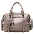 Elegant grey-purple Boston bag with lychee texture and metallic brand tag detail - Gray