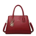 Red pebbled leather tote bag with top handles, adjustable strap and camellia charm - Wine Red Single Bag