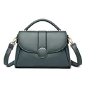 Elegant dark grey leather handbag with large gold round buckle and detachable strap - Blue