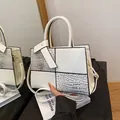 White large capacity handbag with crocodile pattern panels and detachable strap - White