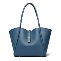 Deep blue bucket bag in litchi grain leather with golden buckle and sleek straps - Blue