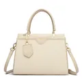 Minimalist beige woven leather handbag with gold hardware and curved handle for women - Off White
