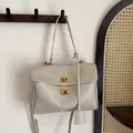 Chic beige crossbody bag with gold square buckles and premium leather texture - Large / Light Gray