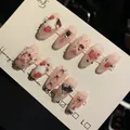 Pink Alice in Wonderland press-on nails with strawberry, bunny, and pearl accents - Short Coffin Shape - Alice Theme / Large (L)