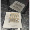 Handmade aurora press-on nails in nude pink with silver metal charms and glitter gradient - XS Extra Small / Short Square Round Style