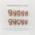 Uñas postizas artesanales con degradado rosa, pedrería de lujo y dijes de perlas finas - Grande (L) / Estilo Ataúd Corto Diamantes de Imitación (630)