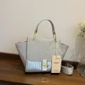 Sac à main ailes vintage argenté en daim mat et cuir de crocodile synthétique - Gris