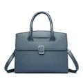 Elegant fog blue trapezoid handbag with premium lychee grain leather and silver buckle - Blue