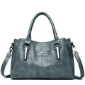 Sac à main bleu-gris avec logo kangourou, poignées et bandoulière réglable - Bleu