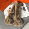 Detail showing plush brown faux fur scarf with soft texture and warm caramel tone - Dark Coffee
