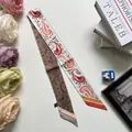 Detail von Paisley und Leopardenmuster Twilly Schal mit seidiger Textur als Schleife - 5x90cm / Beige Aprikose
