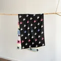 Detail of colorful houndstooth cashmere scarf featuring fringe edges and thick knit texture - 180cmx65cm / Black (S1946)