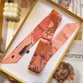 Elegant silk twilly scarf with chain pattern in orange box with lifestyle decor - 5x90cm / Warm Orange Pink Series (S1851-5)