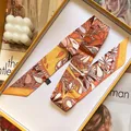 Retro floral silk scarf hair ribbon in orange and yellow tones, elegant gift box styling - Orange