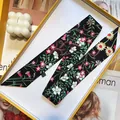 Black floral skinny silk scarf twilly for women with red flowers on yellow gift box cover - Black