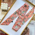 Floral orange satin skinny scarf with lily of the valley print on a bright background - Deep Pink