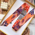 Fashionable silk twilly scarf with giraffe and floral print in orange and blue gift box - Orange