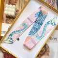 French silk scarf with blue giraffe and pink floral print in elegant gift packaging - Pink