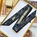 Navy blue skinny silk scarf with dog print in a luxury orange gift box with candle decoration - Black and Blue