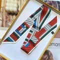 Elegant 100% silk skinny scarf with geometric patterns in a premium gift box - Green