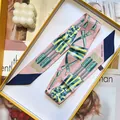 Elegant French equestrian style silk scarf with horse harness patterns in pink and navy blue - Nude Pink