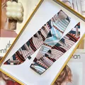 Elegant geometric belt print narrow silk scarf in a white gift box with candle - Brown