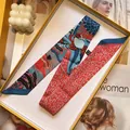 Detailed macro view of double-sided patterned silk twilly scarf in a yellow gift box - Style 4 (S1849-4)