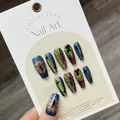 Cat eye press-on nails set featuring mysterious cosmic star patterns and cat eye effect - Large (L) / Cat Eye Starburst Anime Silhouette (858)
